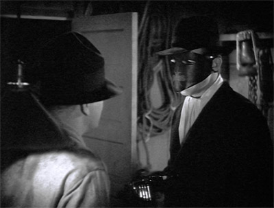 Green Hornet--confronts Markham